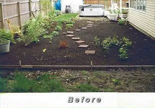 A picture of a backyard before being remodeled.