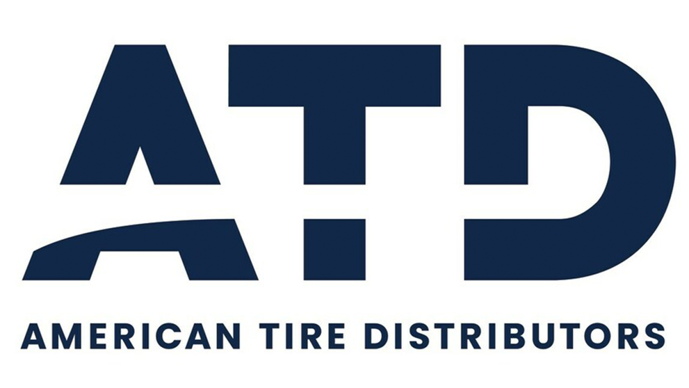 The logo for American Tire Distributors features the dark blue letters