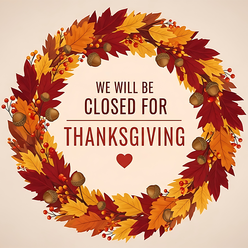 A wreath of autumn leaves, acorns, and berries surrounds the text 