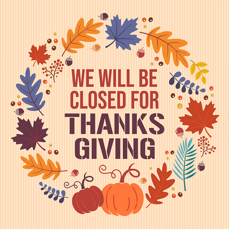 A Thanksgiving closure sign with autumn leaves, acorns, and pumpkins surrounding the text: 