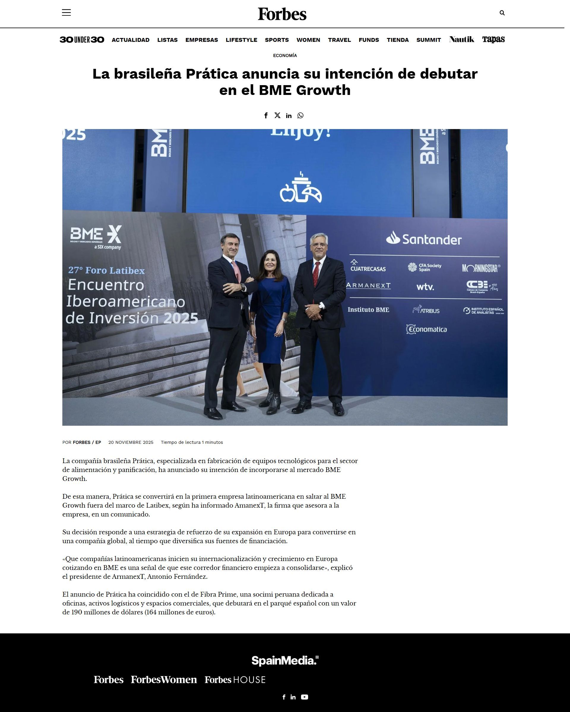 Forbes article: Three people standing in front of a blue wall with logos.