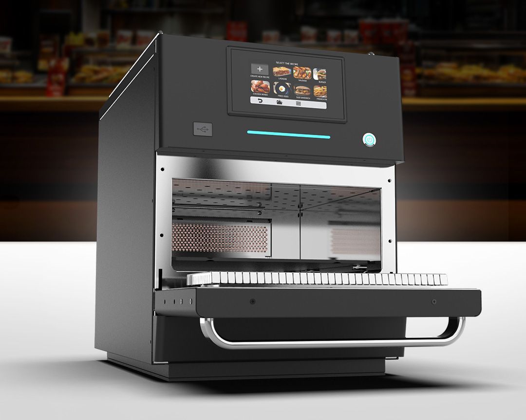 Black automated food preparation machine with touchscreen and pull-out tray.