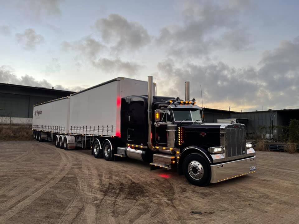 Black Freight Truck With Long Two Containers — NQ Freighters In Brisbane QLD