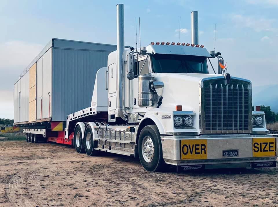Oversize Truck Carrying The Transportable Home For Delivery — NQ Freighters In Bohle QLD