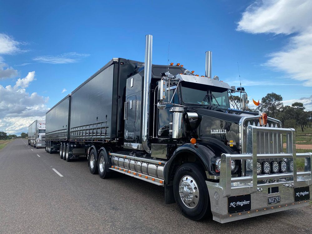 Tow Big Freighters Truck At The Side Of The Highway — NQ Freighters In Townsville QLD