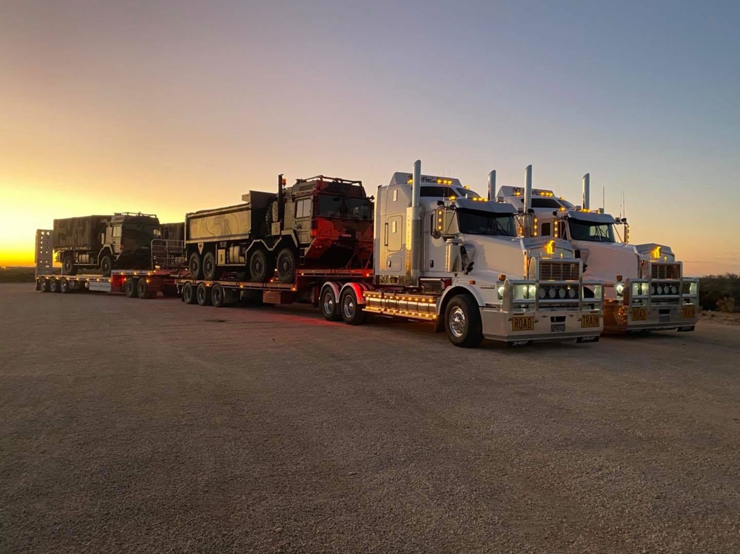 Two Freight Truck Carry And Transport The Army Equipment — NQ Freighters In Brisbane QLD