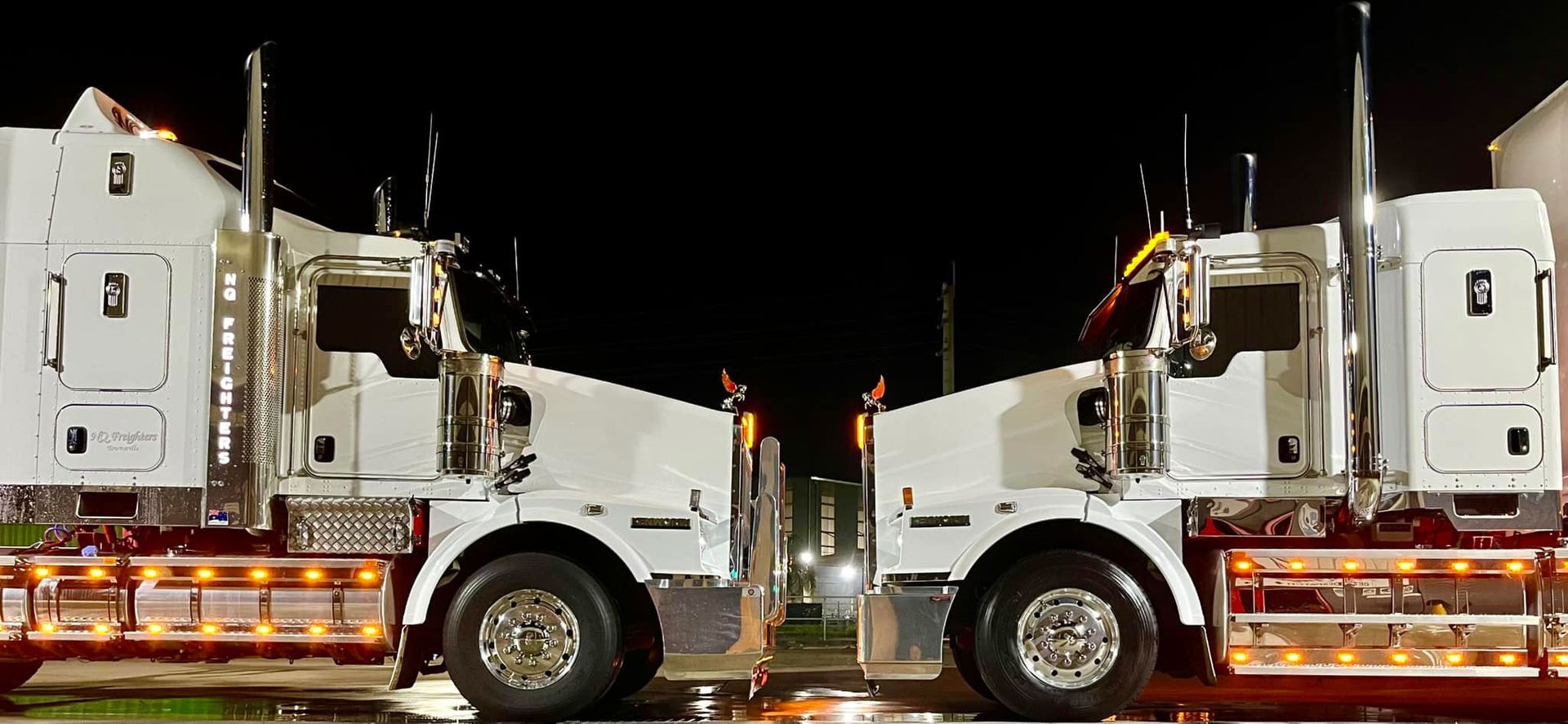 Two Freight Truck Facing To Each Other — NQ Freighters In Bohle QLD
