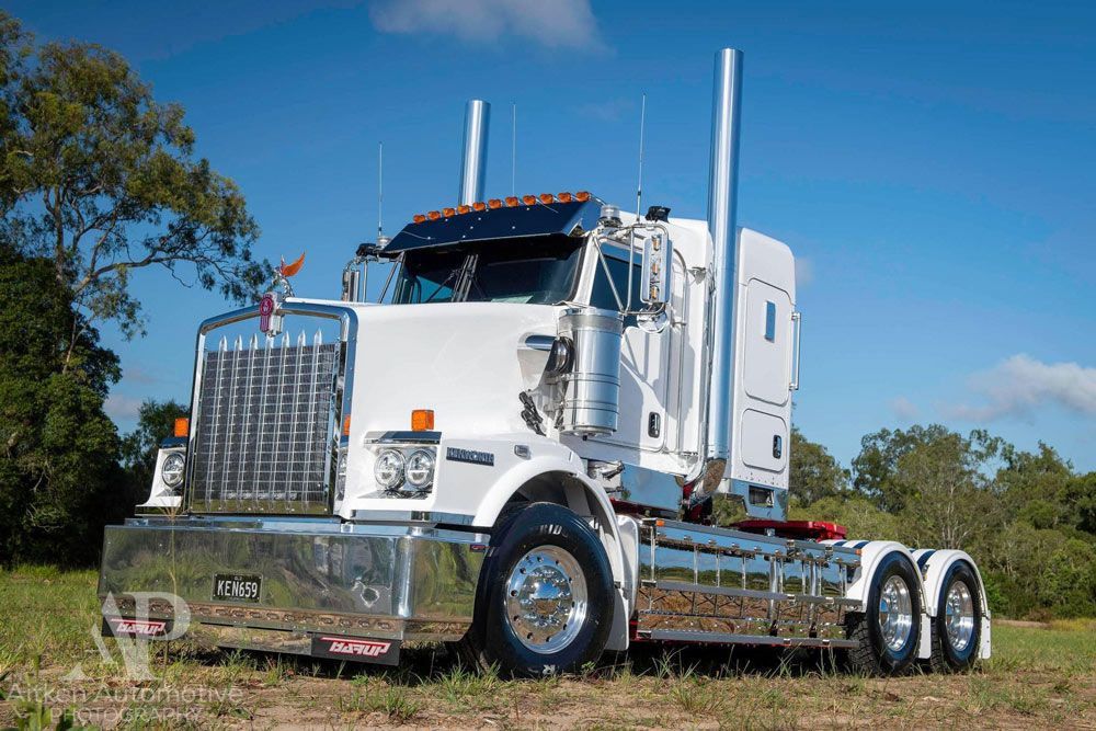 White Freight Truck With Forest Background — NQ Freighters In Bohle QLD