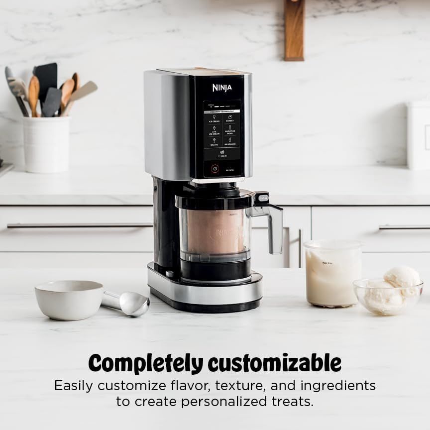 Black countertop coffee maker in a bright kitchen with text: “Completely customizable”