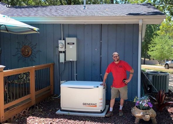 Man Hand Raised And Pointed At Air Conditioning — West Plains, MO — Butler Heating & Air A person who just performed heating system services in Mountain View, MO