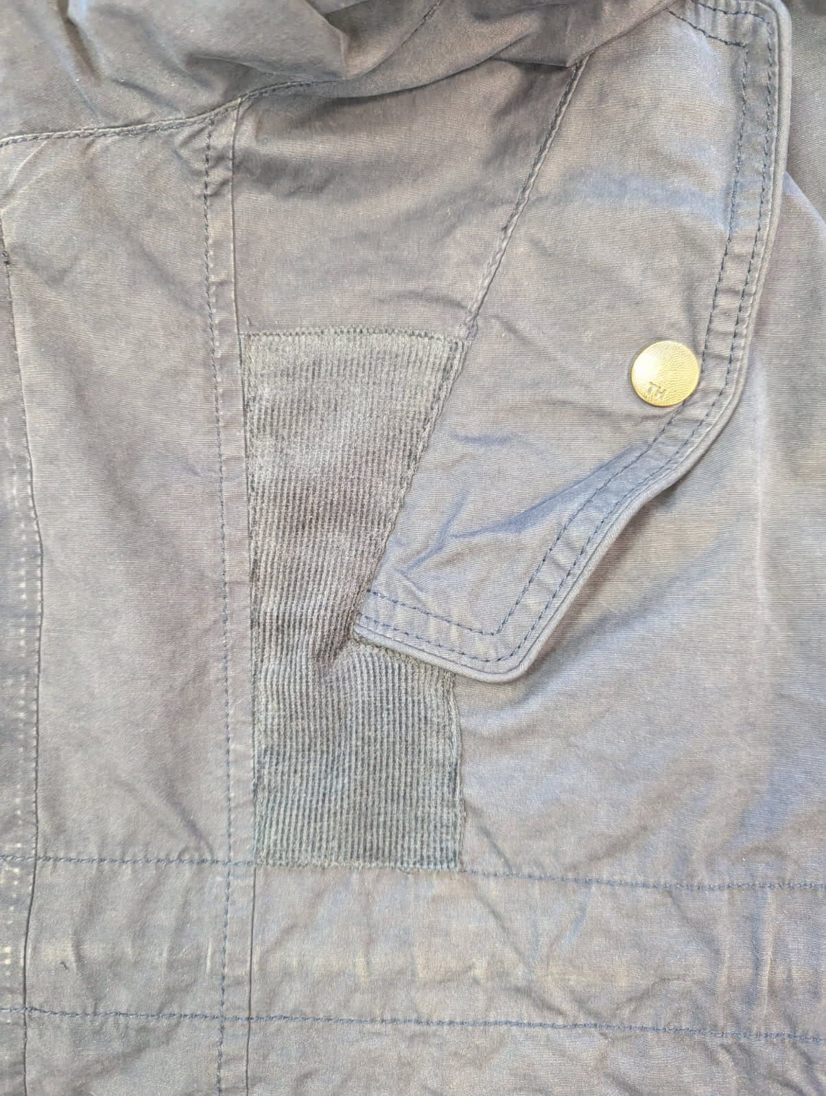 Doublure de veste réparée après passage en atelier de couture