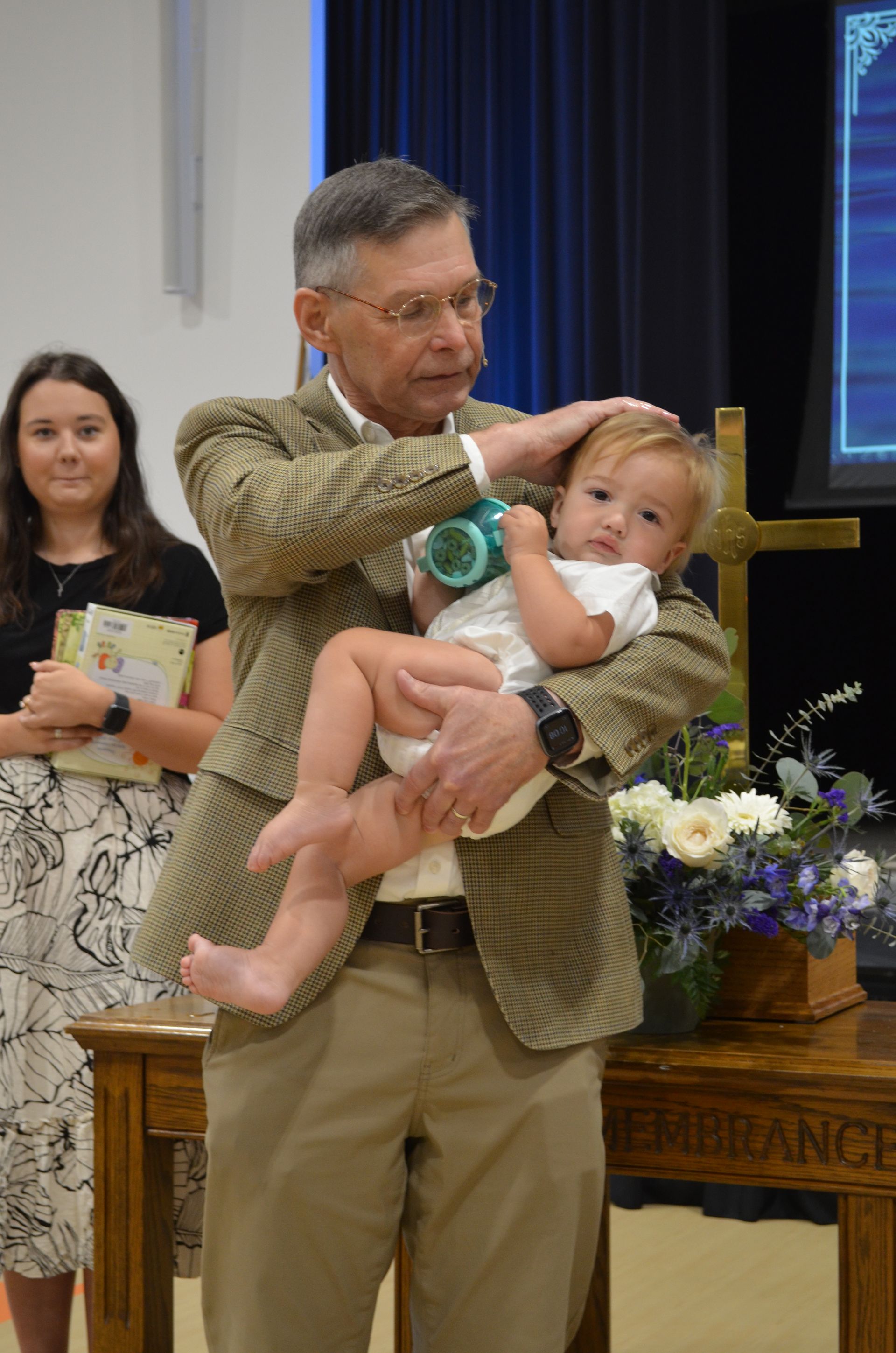 Pastor Bob Rambo baptized a SGMC baby.