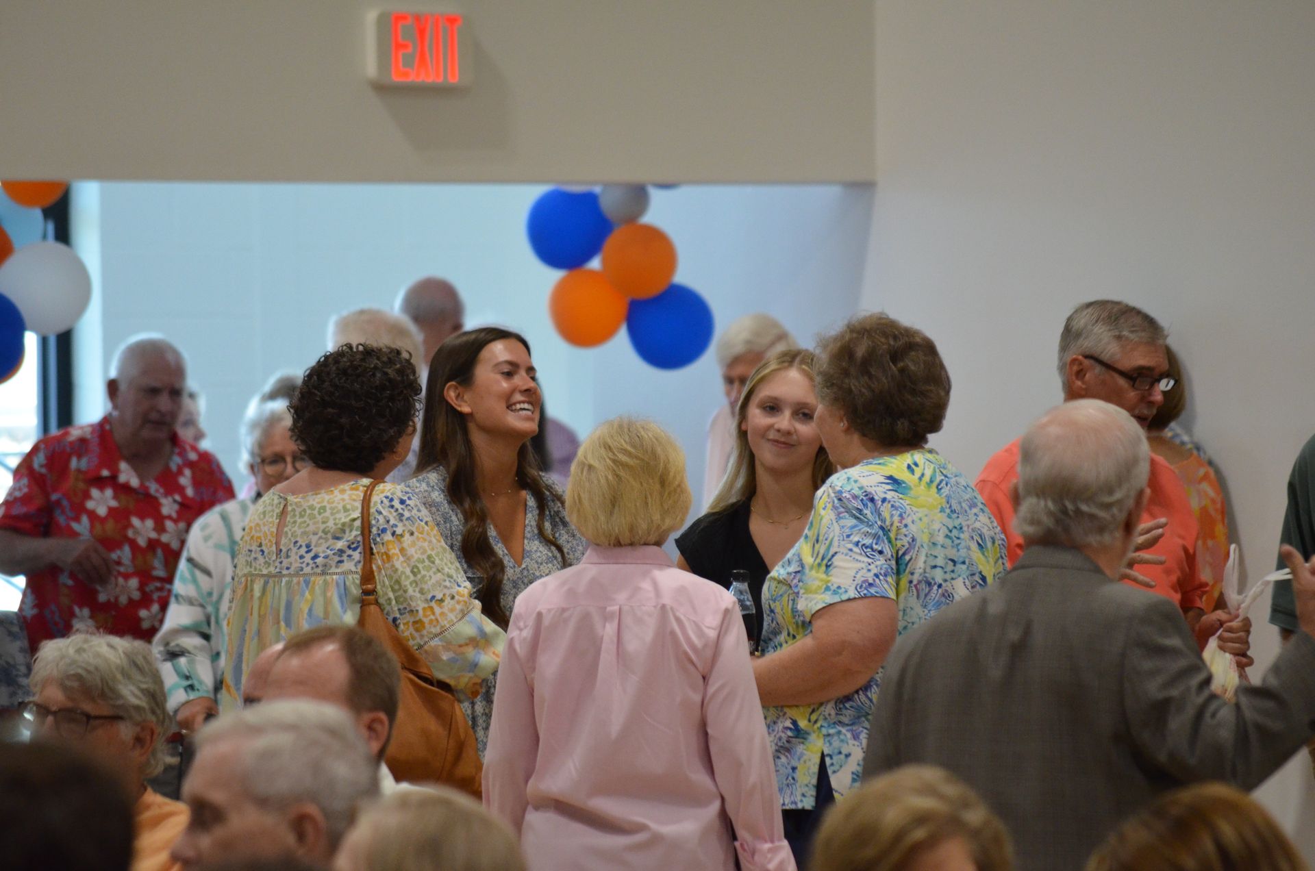Enjoying fellowship before worship.