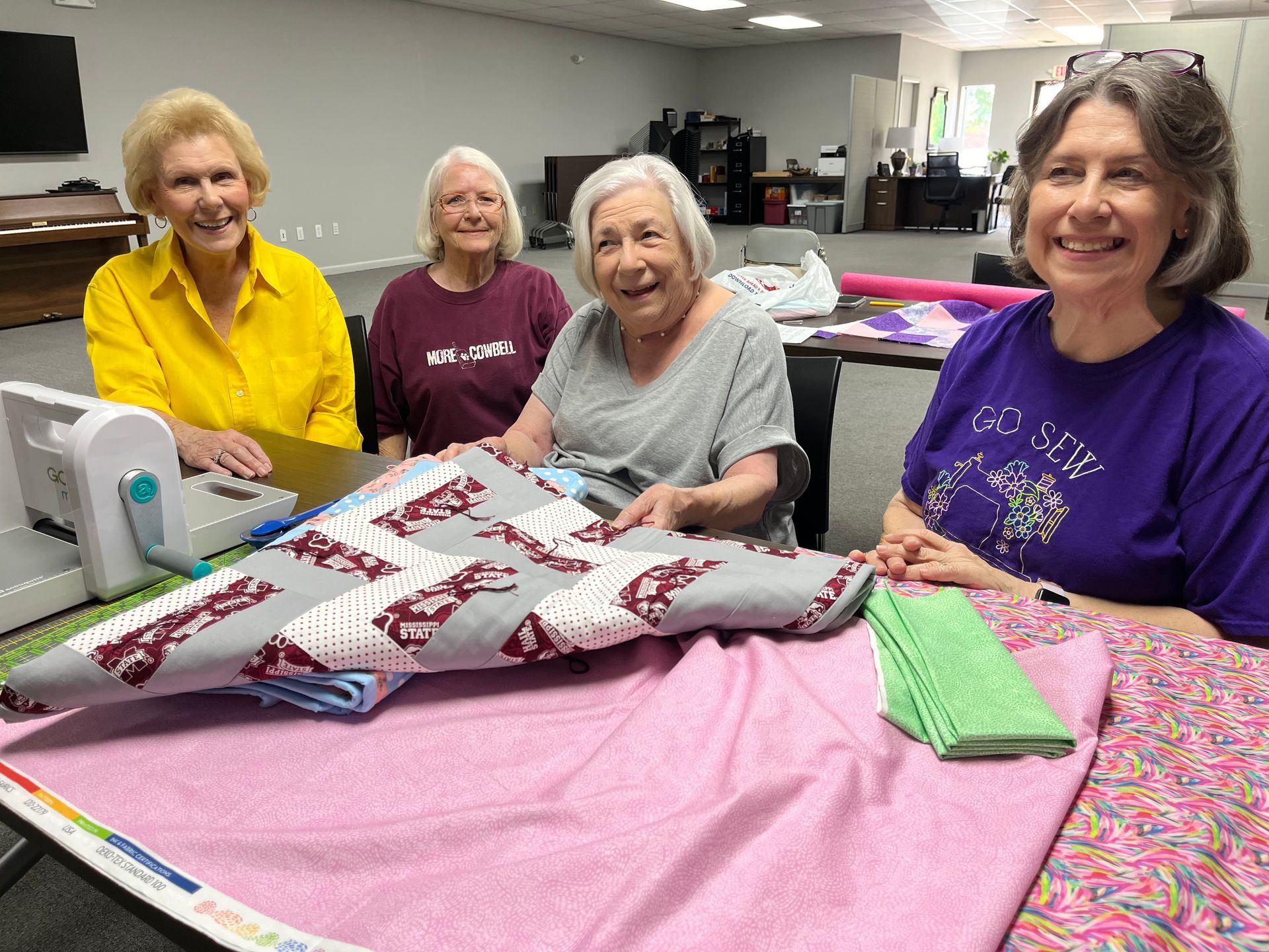 Tying knots in first prayer quilt
