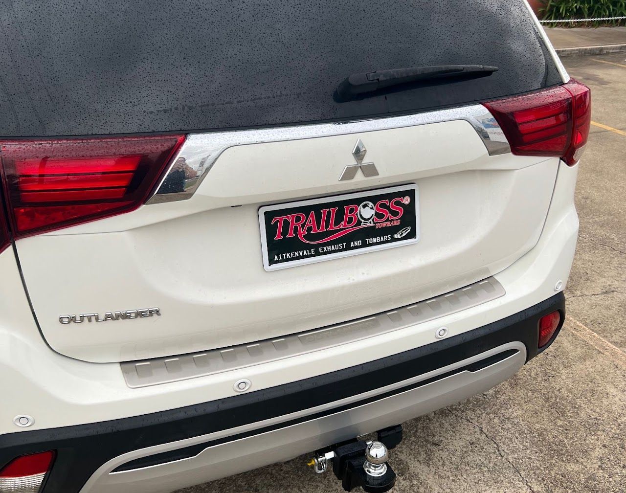 White Mitsubishi SUV Rear With Taillights — Aitkenvale Exhausts & Towbars Pty Ltd In Aitkenvale, QLD