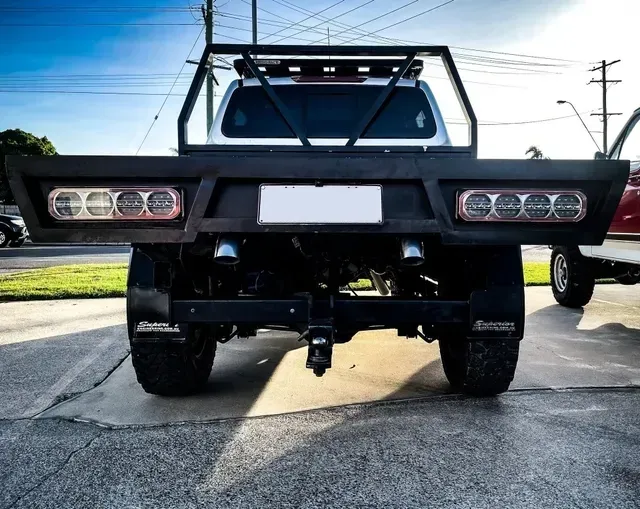 Rear View of a White Truck With a Custom Black Tray — Aitkenvale Exhausts & Towbars Pty Ltd In Aitkenvale, QLD