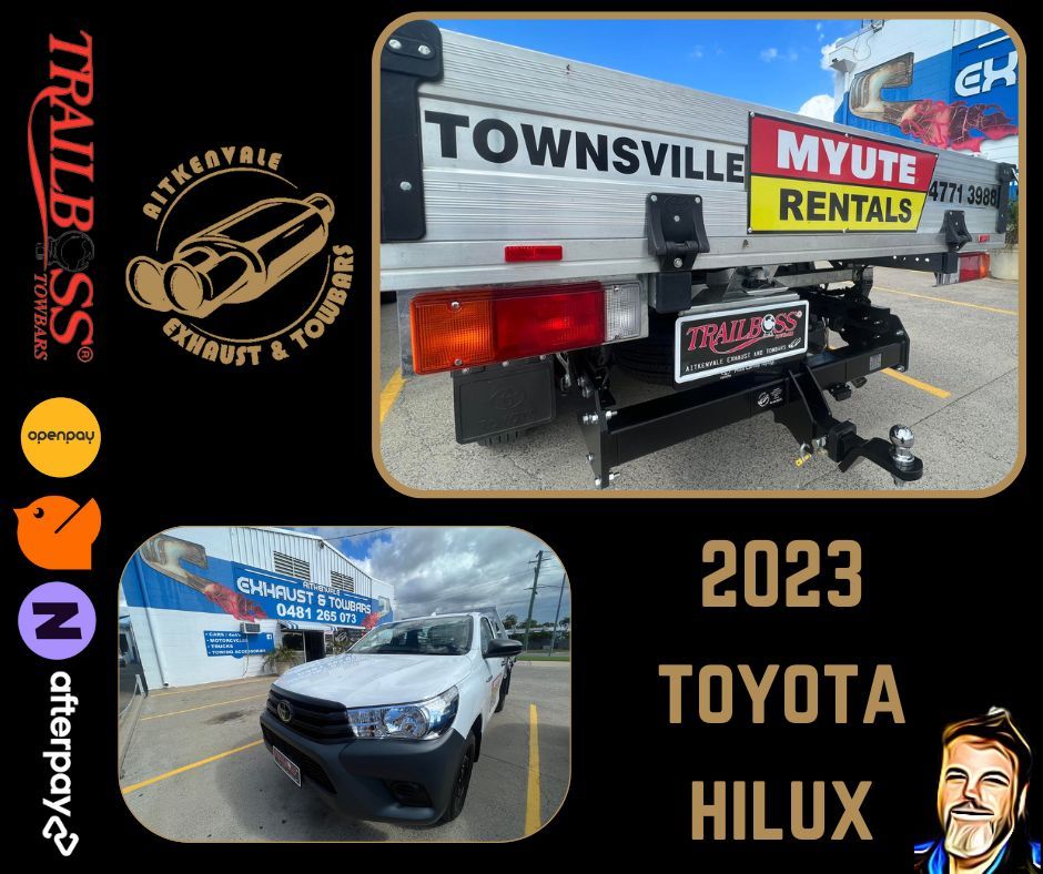 A White 2023 Toyota Hilux With a Tow Bar — Aitkenvale Exhausts & Towbars Pty Ltd In Aitkenvale, QLD
