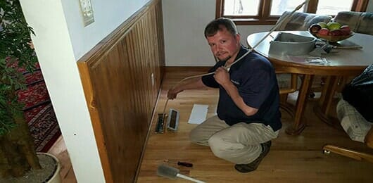 Carpet — Worker Using Vacuum in Rapid City, SD