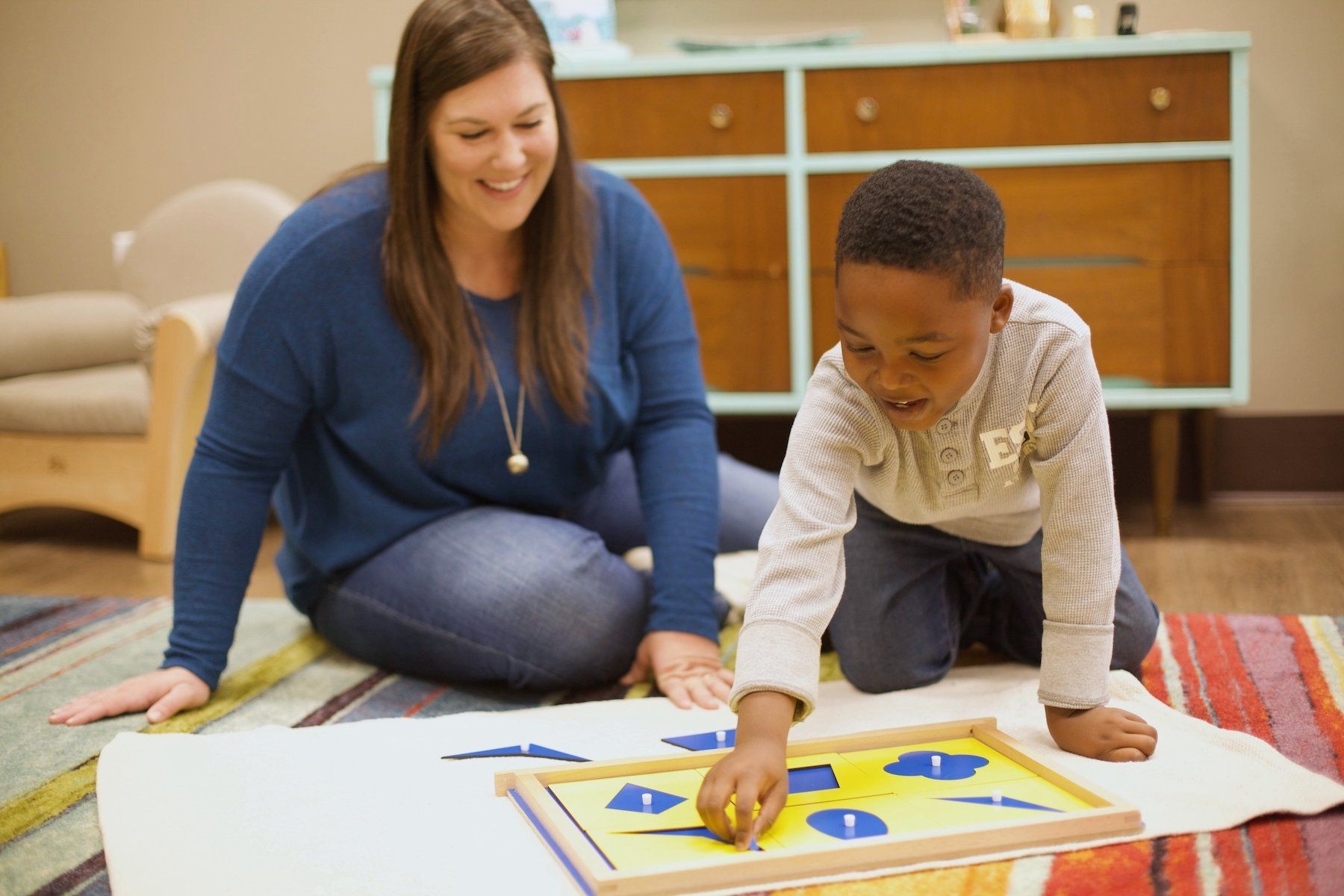 Guide and child in the classroom