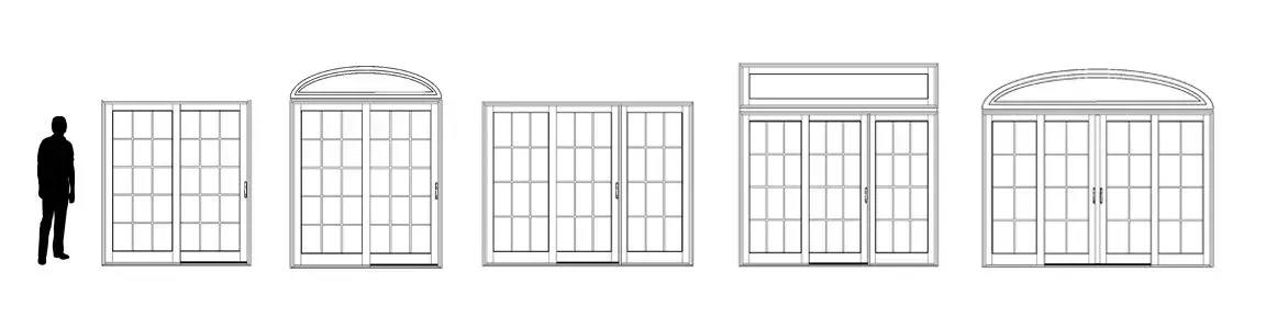 A man is standing in front of a row of different types of windows.