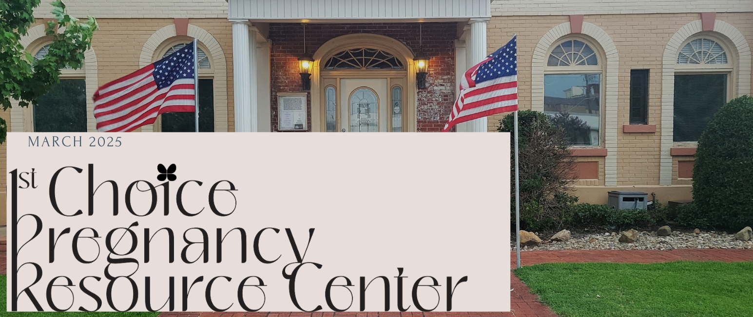 A sign for the choice pregnancy resource center is in front of a building