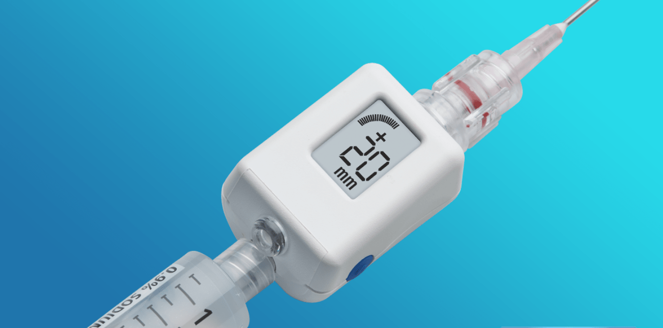 A syringe with a digital thermometer attached to it.