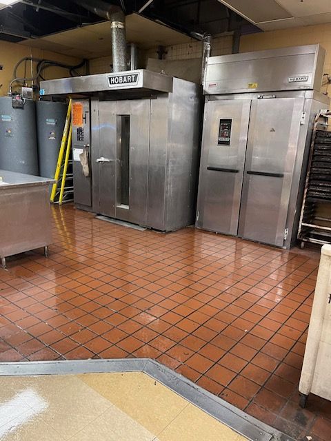 Polished tile floors inside restaurant kitchen Polished tile floors inside restaurant kitchen