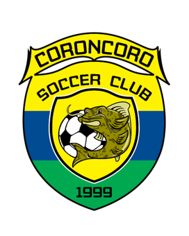Coroncoro Soccer Club crest with yellow banner, blue and green shield, crocodile with soccer ball, and 1999