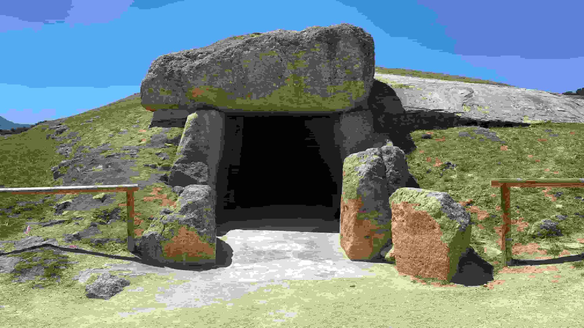 Dolmens filled with lots of rocks and columns.