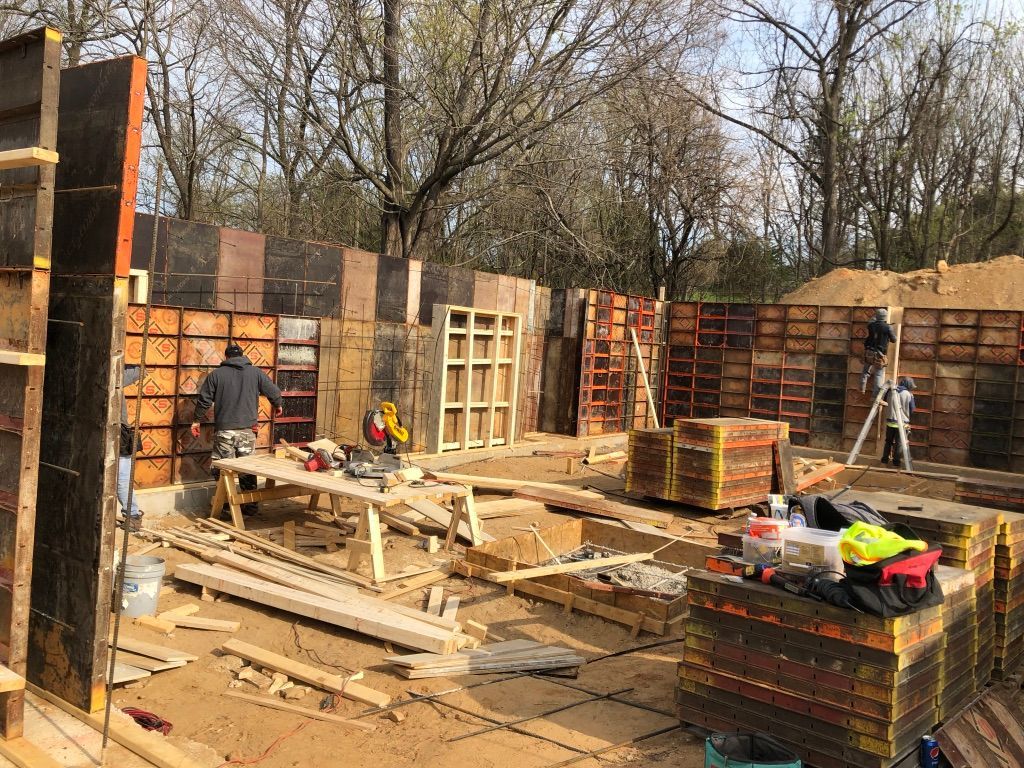 3 men working 