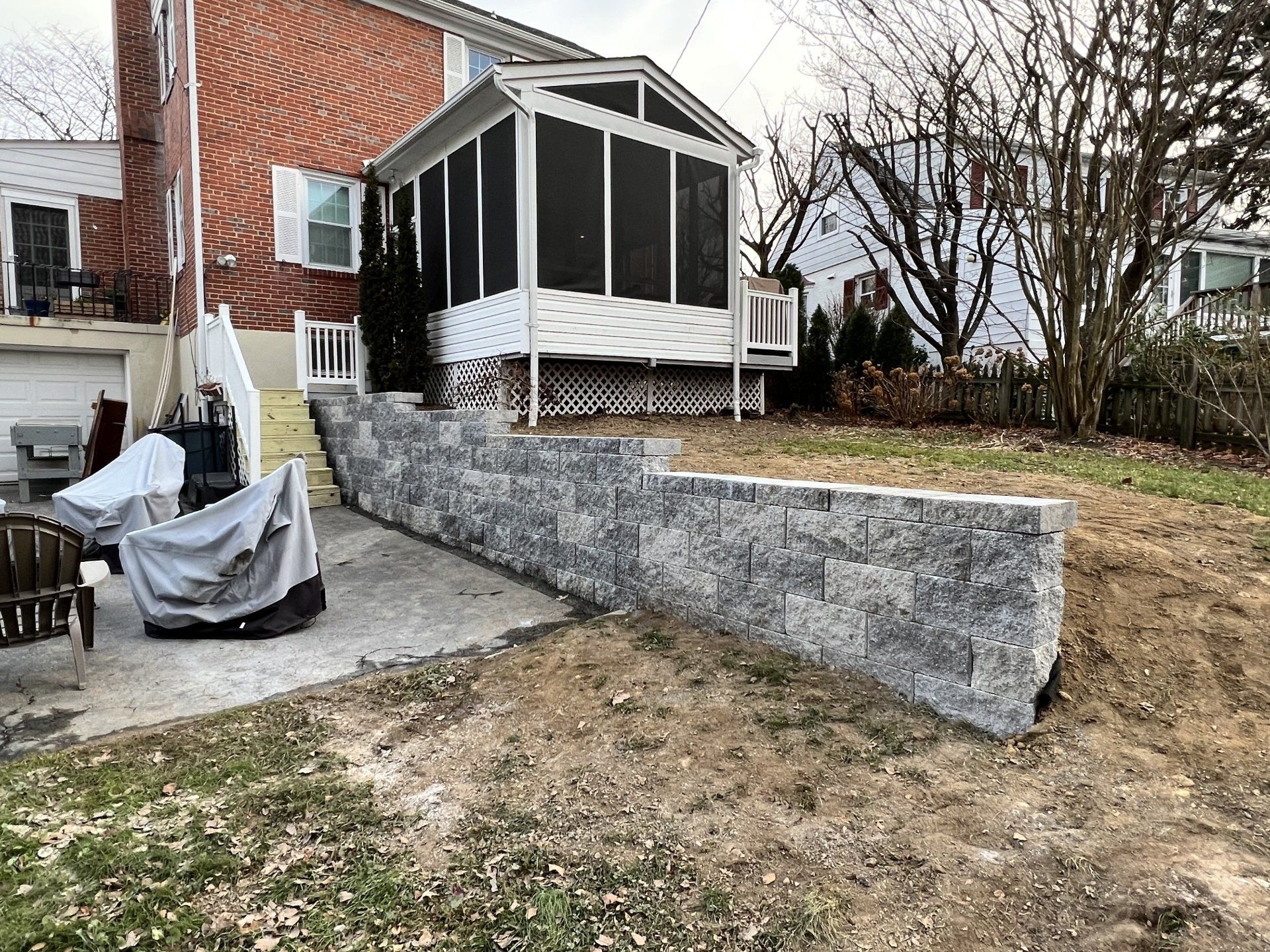 A retaining wall house