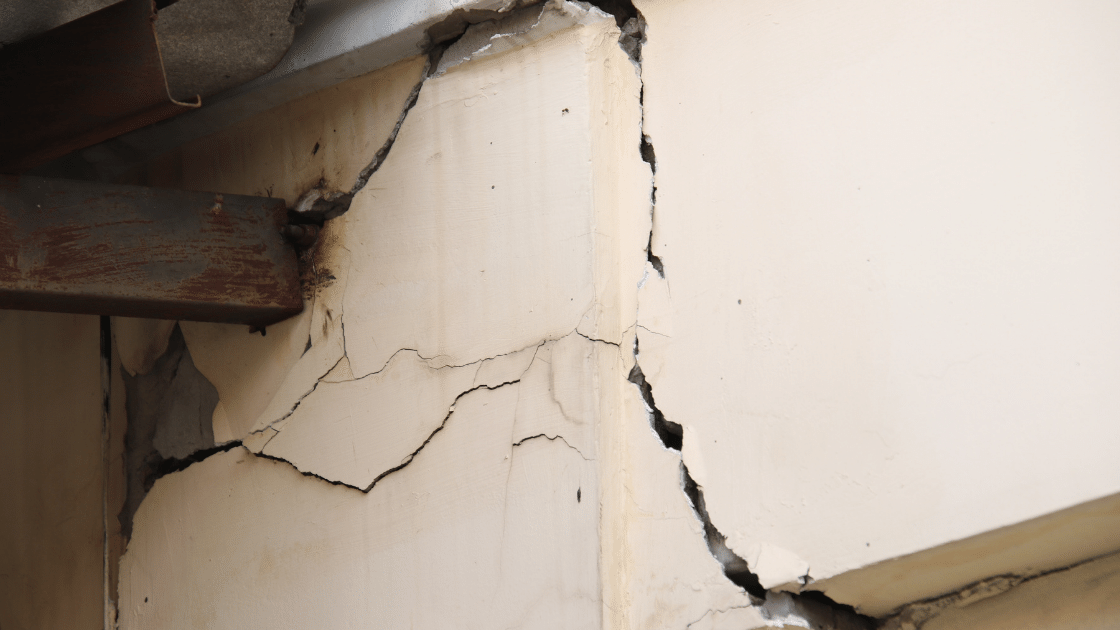 An image of a cracked concrete beam