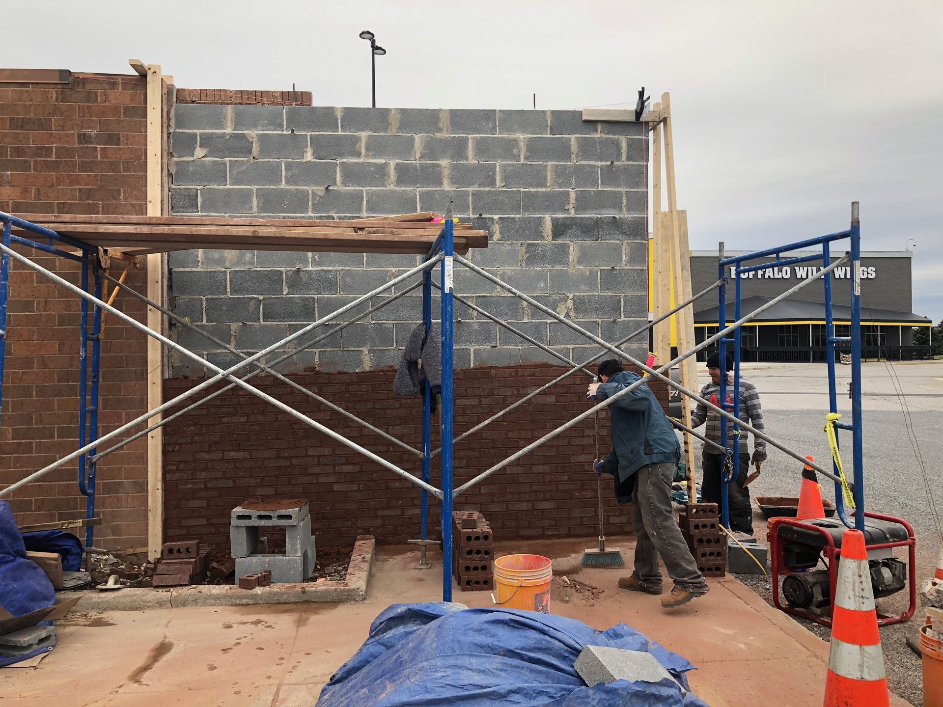 2 construction men working