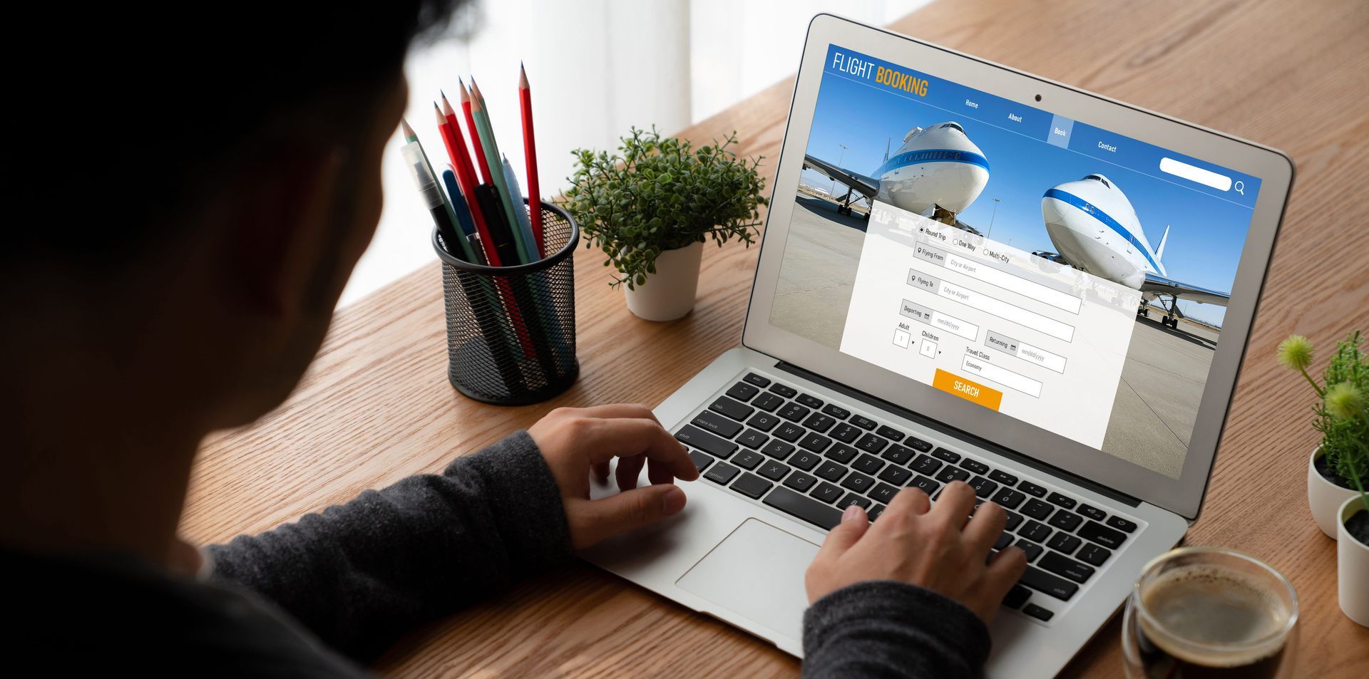 person planning trip online