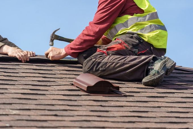 Roof tile on top of new house