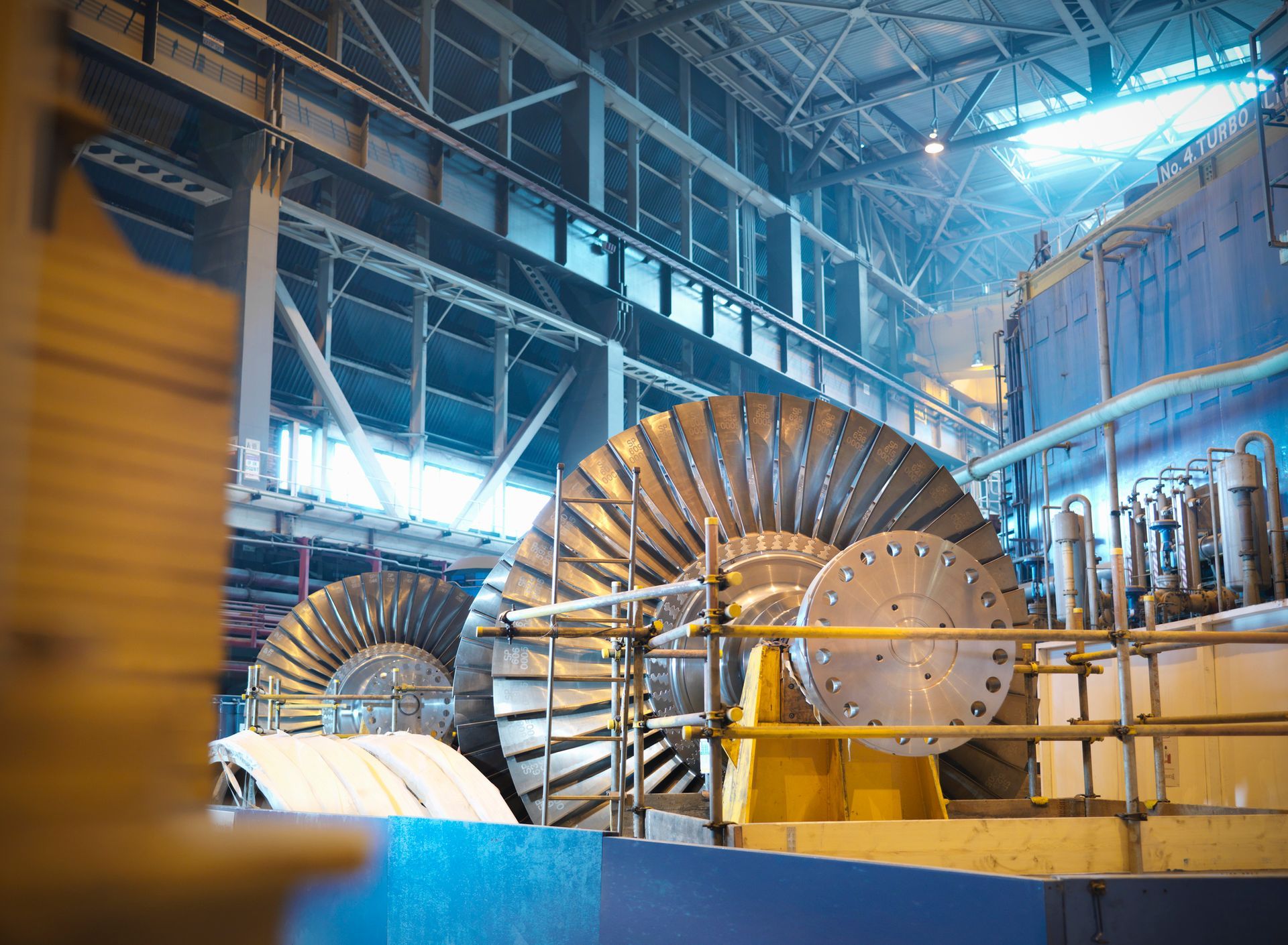 A factory with a lot of turbines in it.