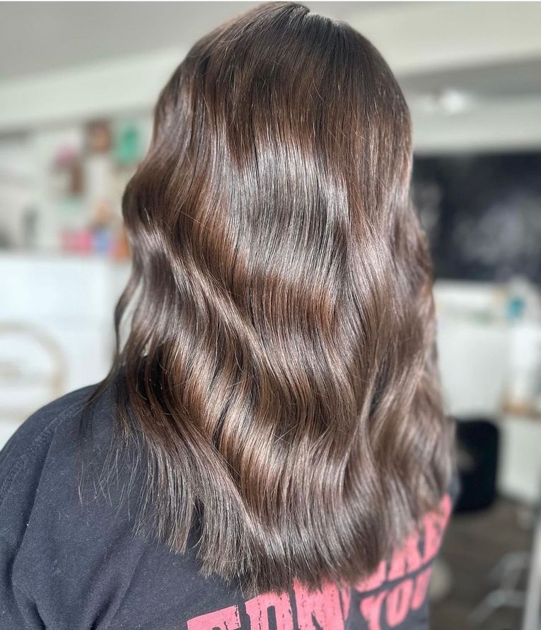 The Back Of A Womans Head With Short Hair And A Plaid Shirt — Freedom Hairdressing In Casino, NSW
