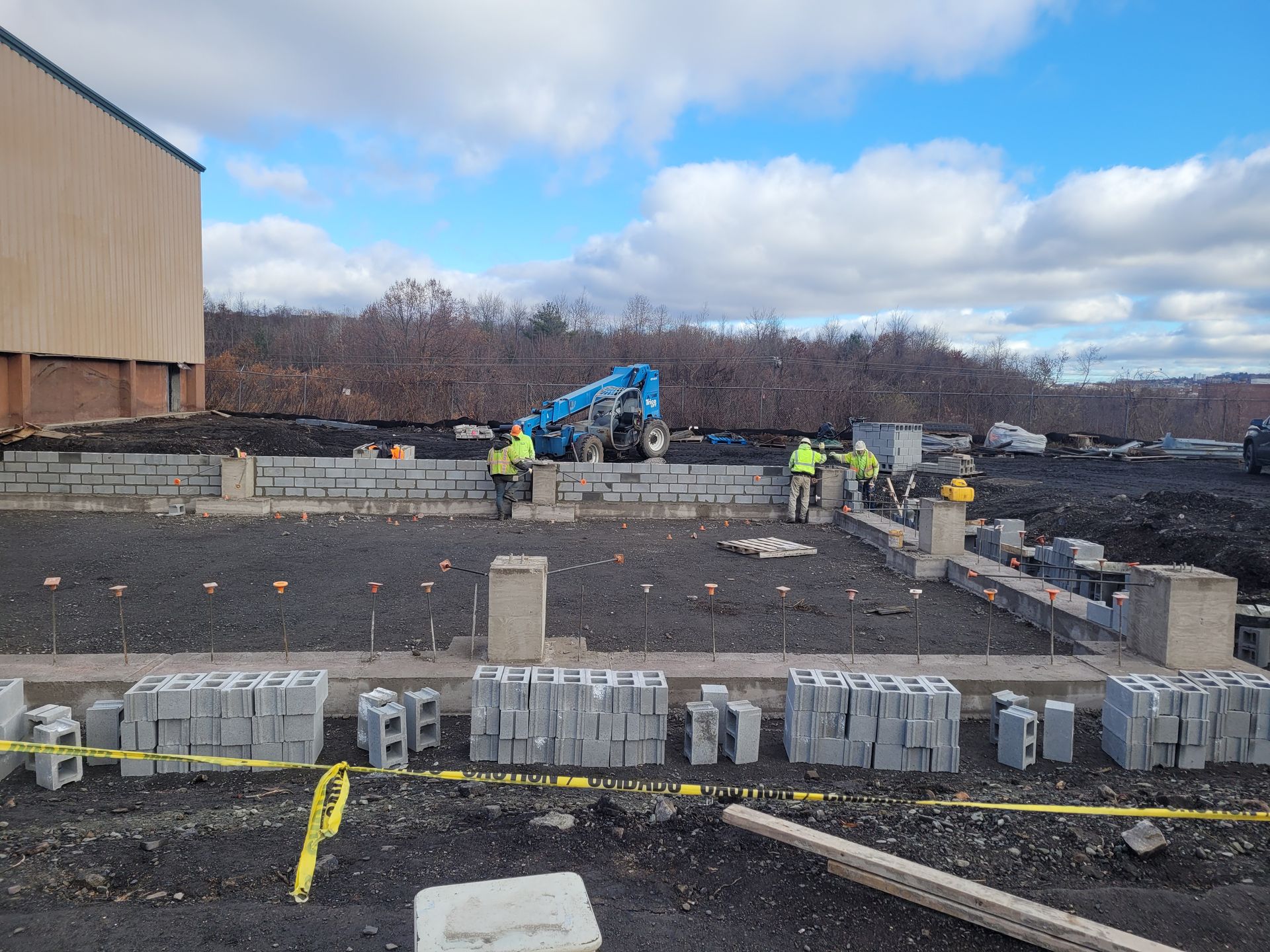 A group of construction workers are working on a Kobalt Construction Site