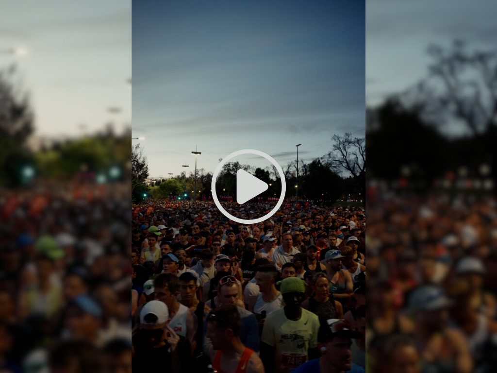 Mass crowd of runners pre race at dawn.