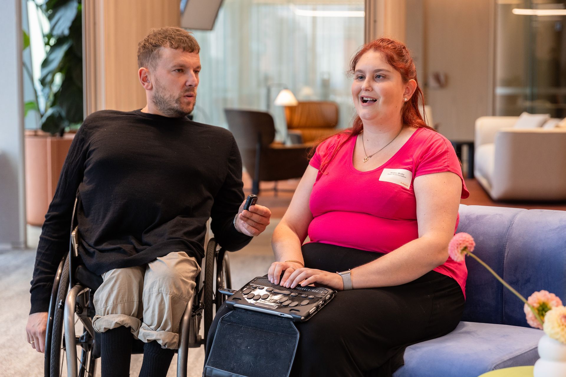 Dylan (left) and recipient Kirsten (right) side by side as Kirsten's reads braille music.