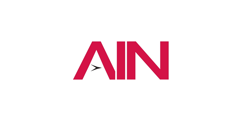 A pink ain logo on a white background