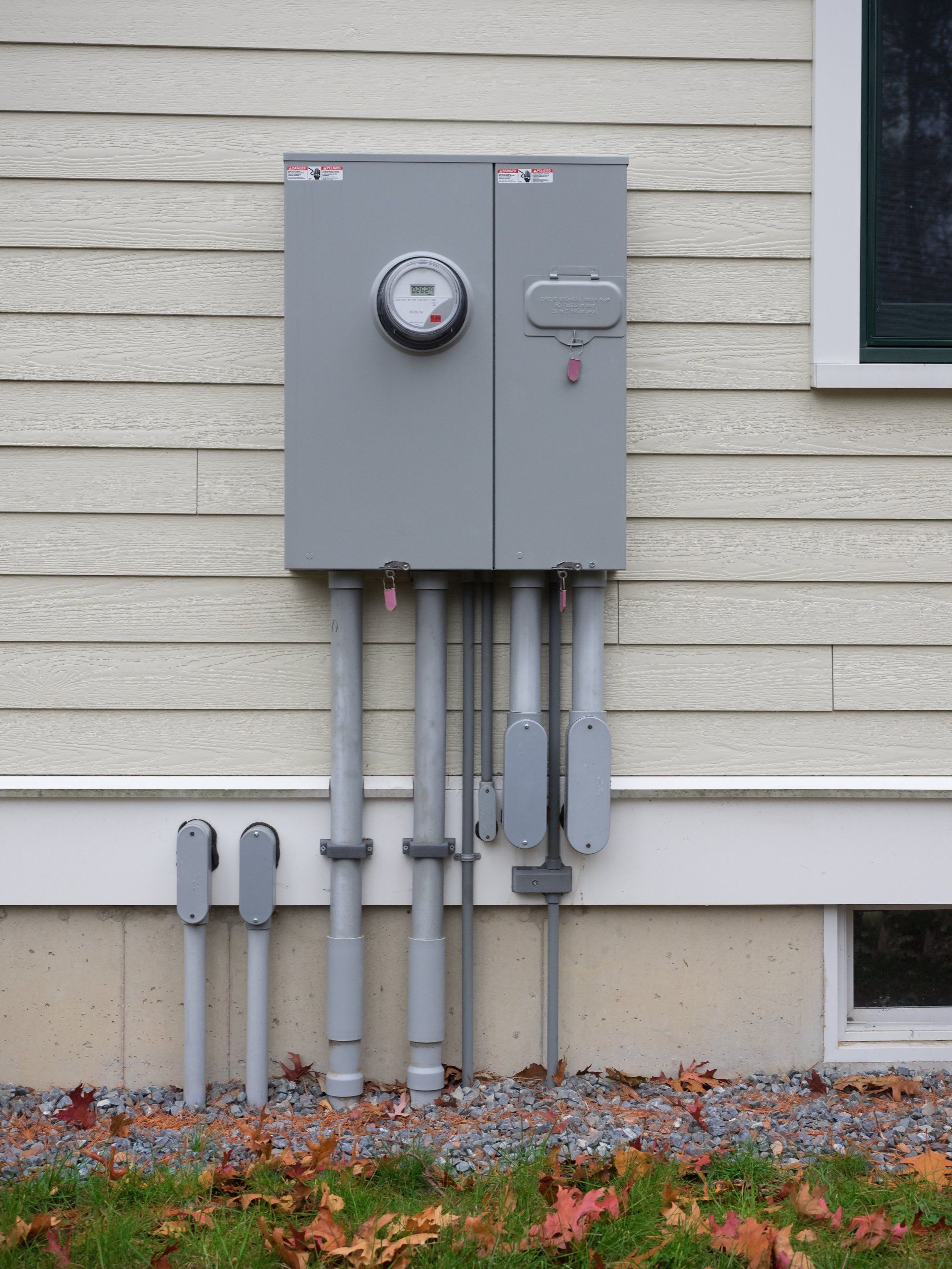 A professionally installed power entrance on the side of a residential home to provide electricity