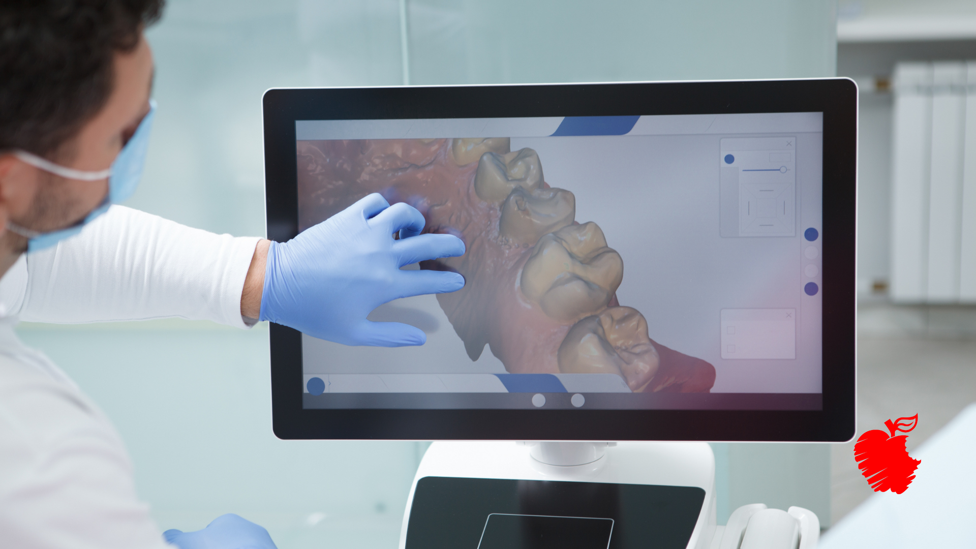 A dentist is using a computer to scan a patient 's teeth.