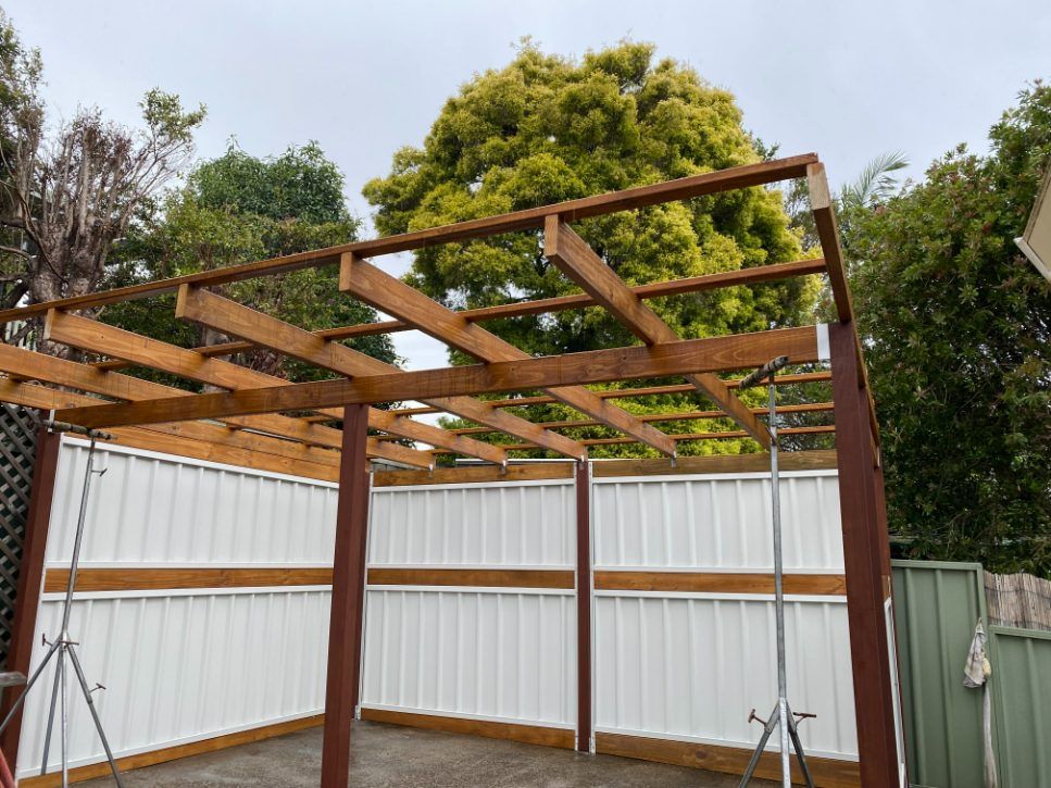 A Wooden Structure Is Being Built — Newcastle Patio Covers In Wallsend, NSW