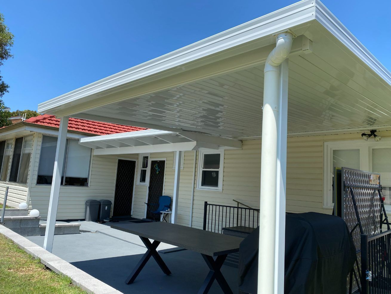 A White House With An Awnings — Newcastle Patio Covers In Wallsend, NSW
