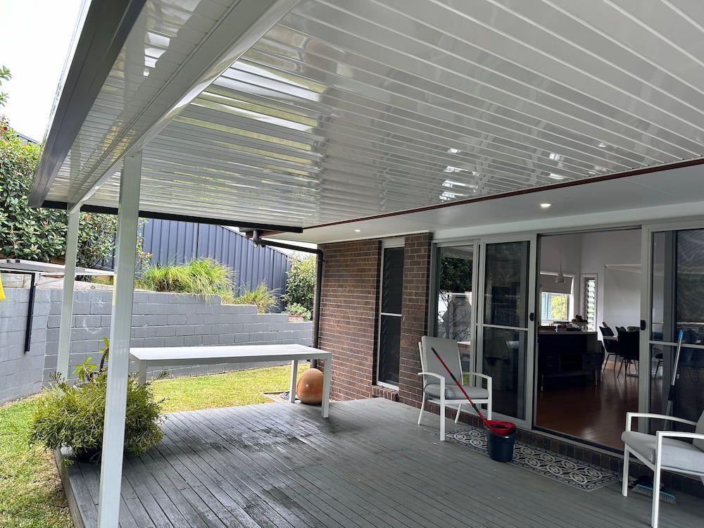 A Verandah With A Table — Newcastle Patio Covers In Wallsend, NSW