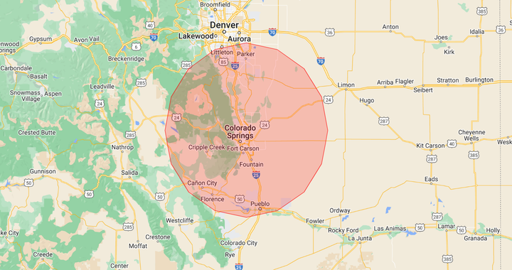 A map of a city with a red circle around it.