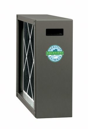 Gray air filter cabinet with a green circular label and black vent opening