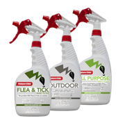 Three red-and-white Nature’s Miracle spray bottles for flea & tick, outdoor, and all-purpose cleaners.