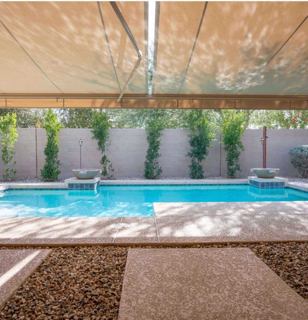 retractable style patio awning in Phoenix, Az backyard